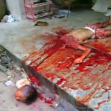 Thai man cuts the head off his children - warning graphic